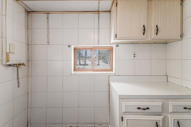 bathroom with tasteful backsplash