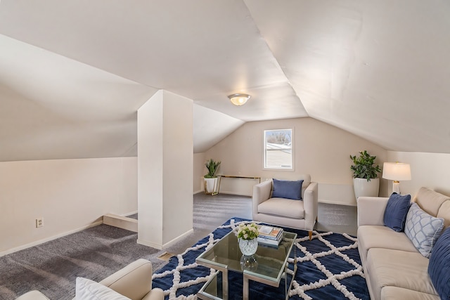 living area with lofted ceiling, carpet flooring, and baseboards