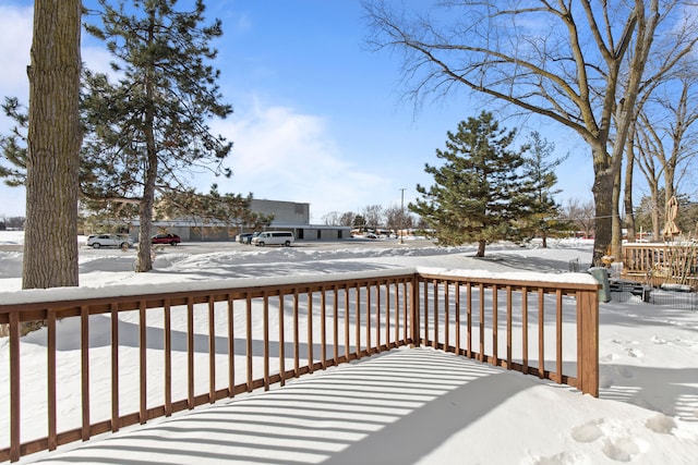 view of snow covered deck