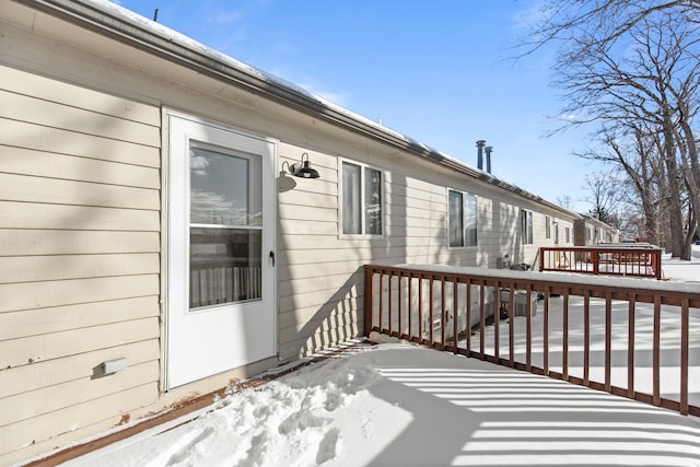 view of snow covered deck