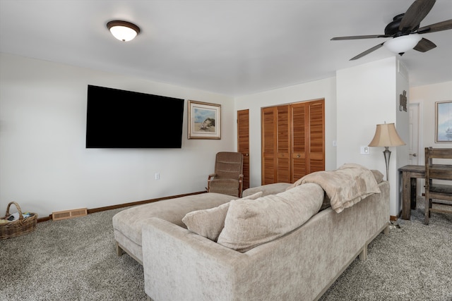 8860 Rushside Dr, Pinckney, MI 48169 - living room featuring carpet floors, a ceiling fan, and baseboards