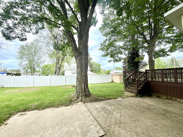 2264 Lynn Dr, Saint Joseph, MI 49085 - view of yard with a patio, a wooden deck, and stairway