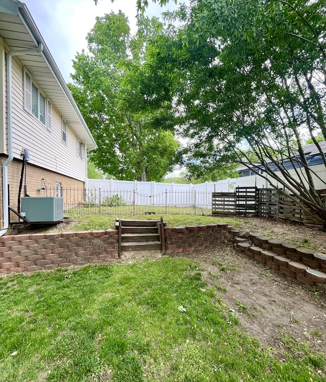 2264 Lynn Dr, Saint Joseph, MI 49085 - view of yard featuring central AC unit