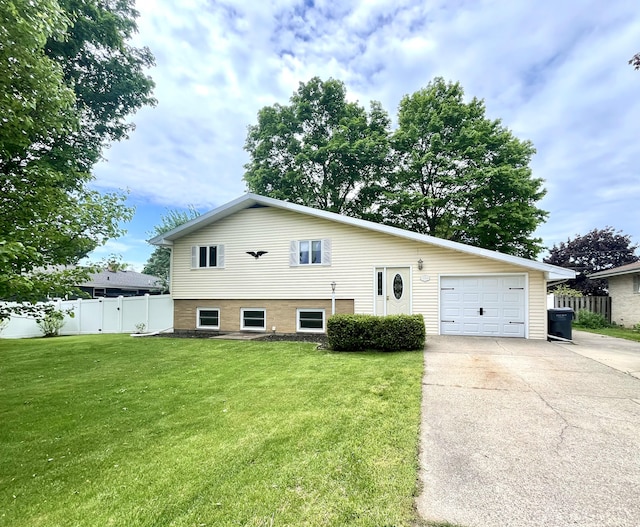2264 Lynn Dr, Saint Joseph, MI 49085 - view of front of home featuring driveway and a garage