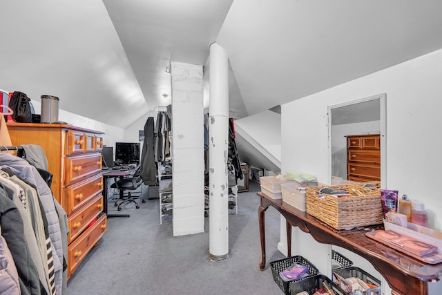 home office featuring lofted ceiling