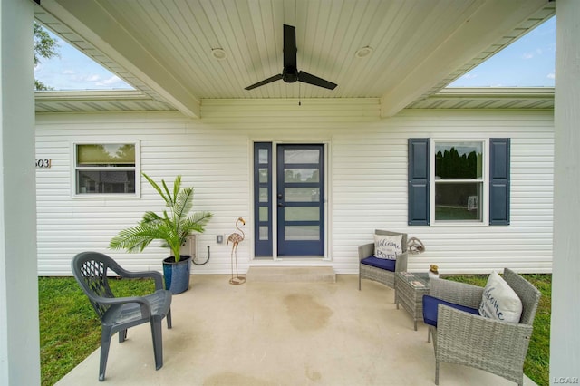 view of patio featuring a ceiling fan