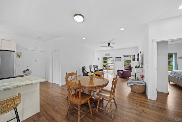 dining space featuring ceiling fan, baseboards, dark wood finished floors, and recessed lighting