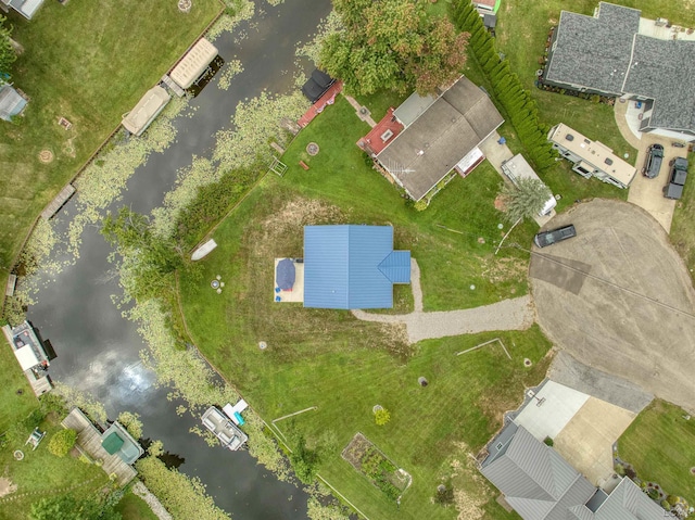 aerial view with a water view and a residential view