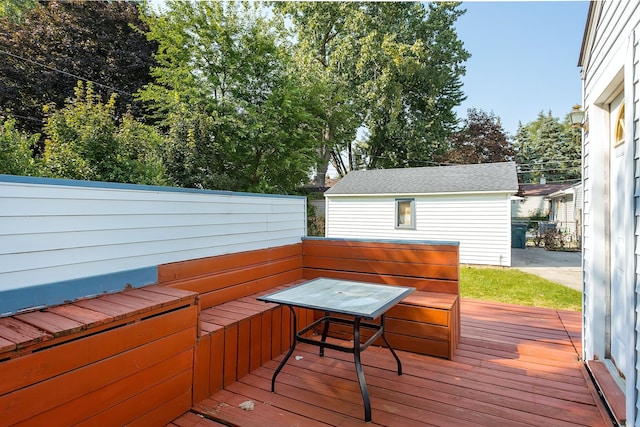 deck with an outbuilding