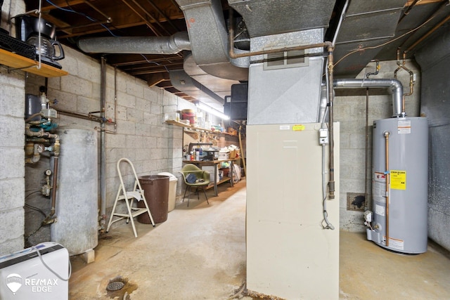 unfinished below grade area featuring gas water heater, visible vents, and heating unit