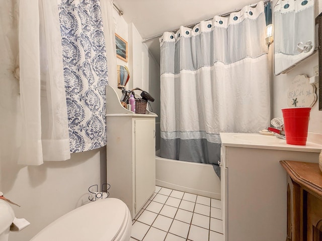 bathroom featuring toilet, shower / tub combo, tile patterned flooring, and vanity