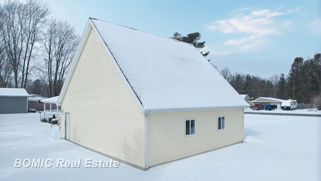 view of snow covered property