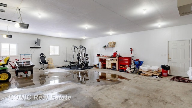 garage featuring a garage door opener