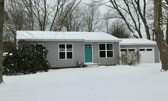 ranch-style home featuring an attached garage