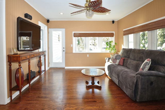 living area featuring dark wood-style floors, ornamental molding, a ceiling fan, and recessed lighting