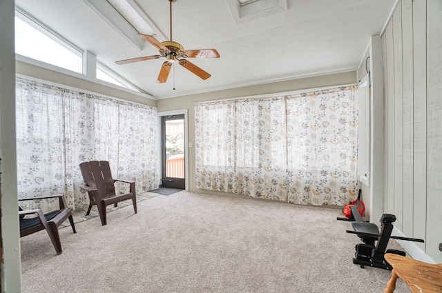 sitting room featuring light carpet, ceiling fan, and lofted ceiling