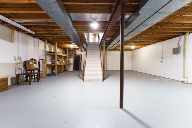 unfinished basement with stairway