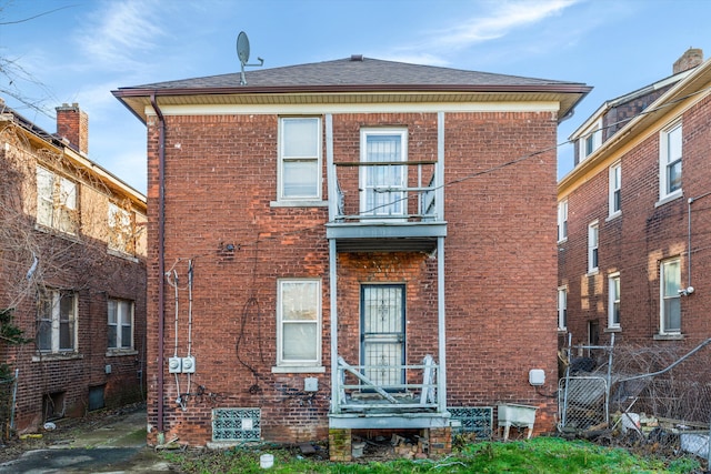 view of front of home with brick siding