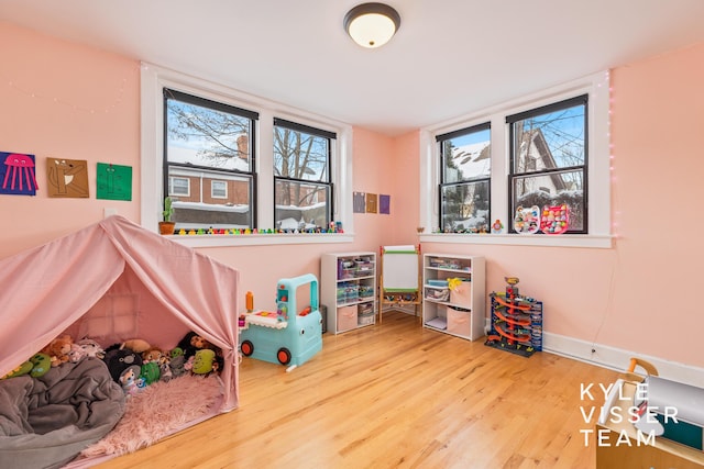 playroom featuring wood finished floors