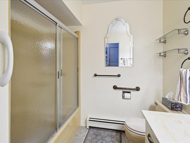 bathroom featuring a baseboard heating unit, bath / shower combo with glass door, vanity, and toilet