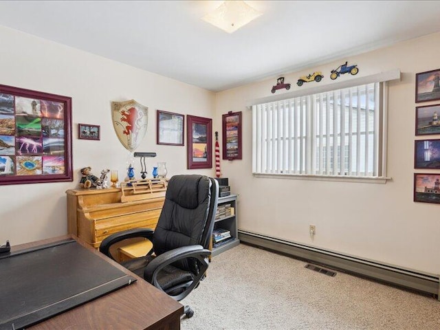 carpeted office featuring visible vents and baseboard heating