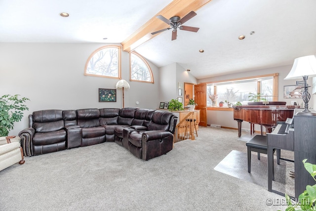 living room featuring light carpet, ceiling fan, lofted ceiling with beams, and plenty of natural light