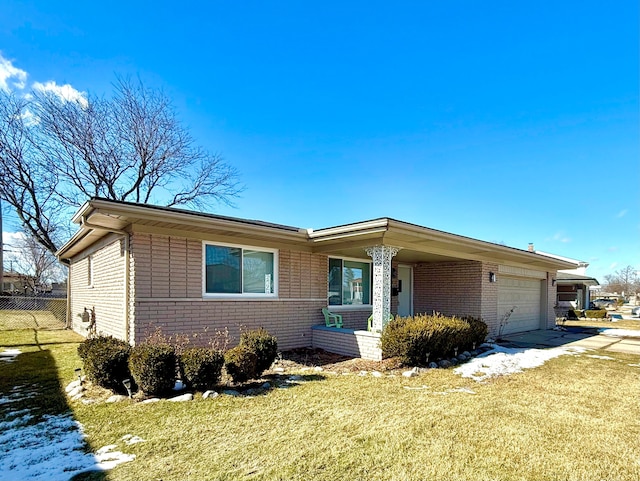 single story home with brick siding, concrete driveway, fence, a garage, and a front lawn