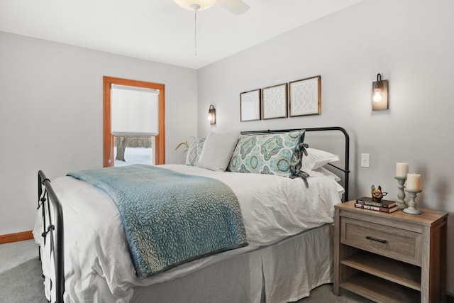 bedroom featuring ceiling fan, baseboards, and carpet flooring