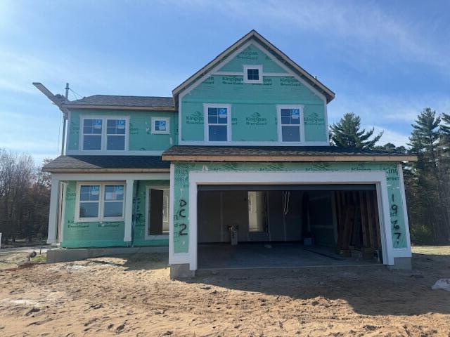 1967 Lowe Dr, Spring Lake, MI 49456 - property in mid-construction with an attached garage