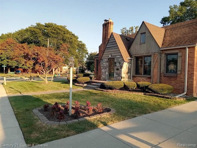 exterior space with a yard