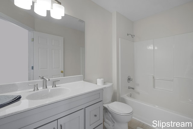 full bathroom with shower / tub combination, vanity, and toilet