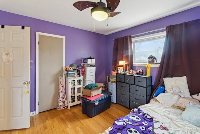 bedroom featuring ceiling fan and light wood finished floors