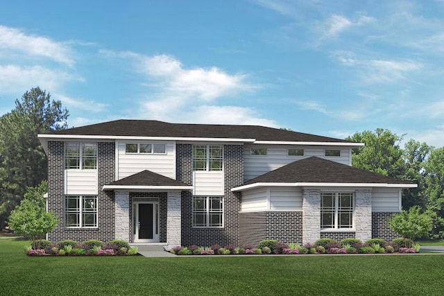 view of front of house with a front lawn, a shingled roof, and brick siding