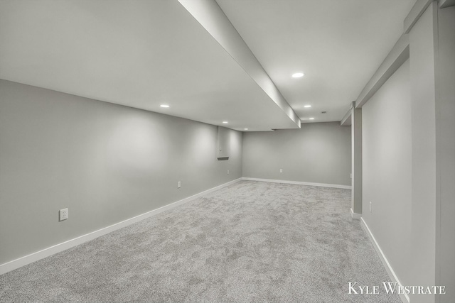 finished basement with carpet floors, recessed lighting, and baseboards