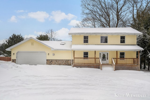 view of front of property with a porch and an attached garage