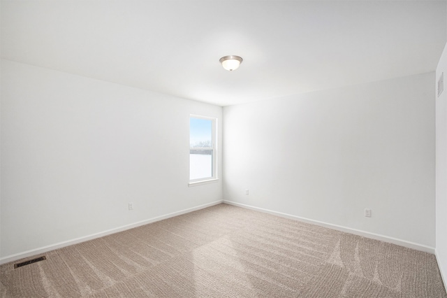 72180 Van Dyke, Bruce, MI 48065 - spare room with light colored carpet and baseboards