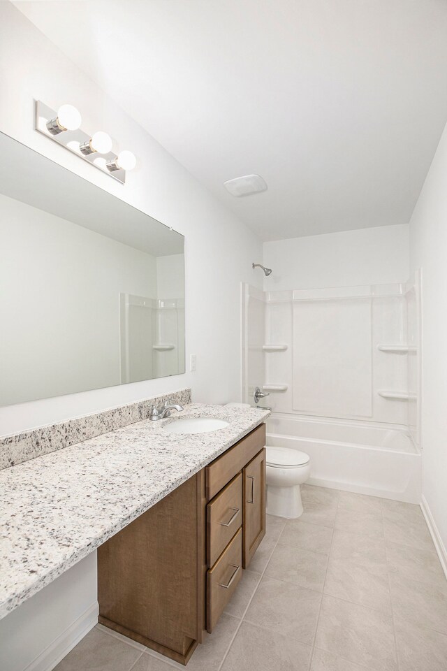 72180 Van Dyke, Bruce, MI 48065 - full bathroom with vanity, washtub / shower combination, toilet, and tile patterned floors