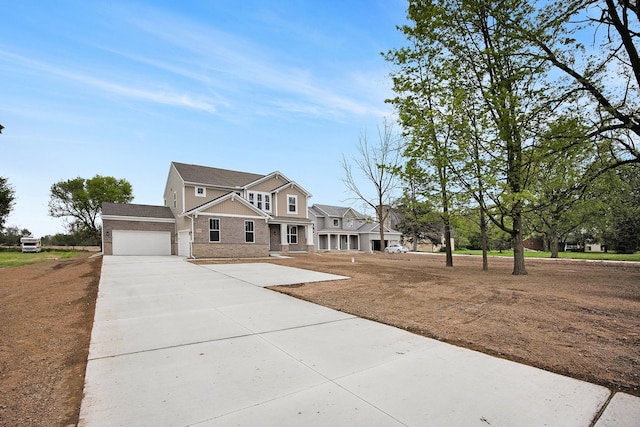 72180 Van Dyke, Bruce, MI 48065 - view of front facade featuring driveway, an attached garage, and brick siding