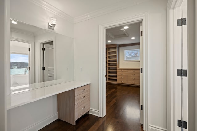 bathroom with hardwood / wood-style flooring, vanity, crown molding, and recessed lighting