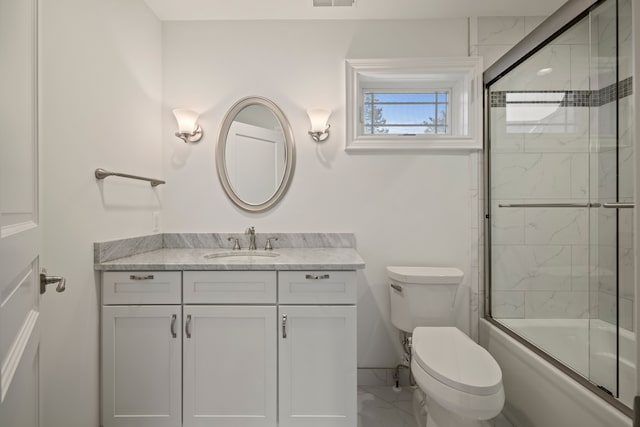 bathroom featuring enclosed tub / shower combo, toilet, visible vents, vanity, and marble finish floor