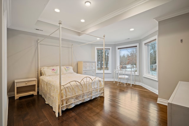 bedroom with crown molding, baseboards, wood finished floors, and recessed lighting