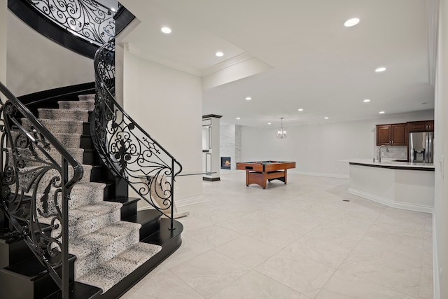 recreation room with ornamental molding, recessed lighting, pool table, and a sink