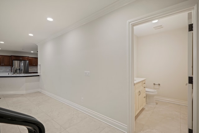 interior space featuring ornamental molding, recessed lighting, visible vents, and baseboards