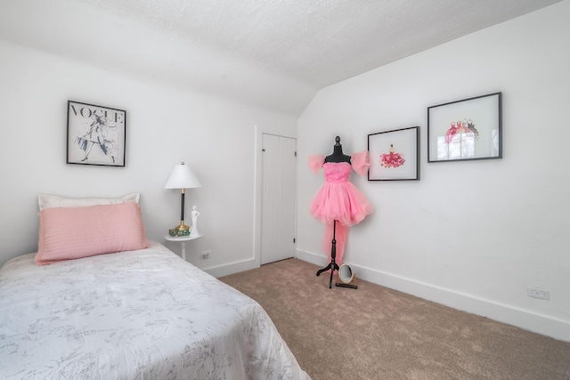 carpeted bedroom featuring baseboards, vaulted ceiling, and a textured ceiling