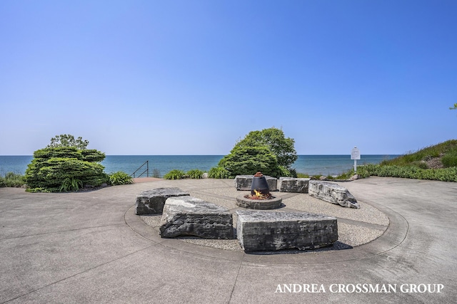 view of patio / terrace with a water view