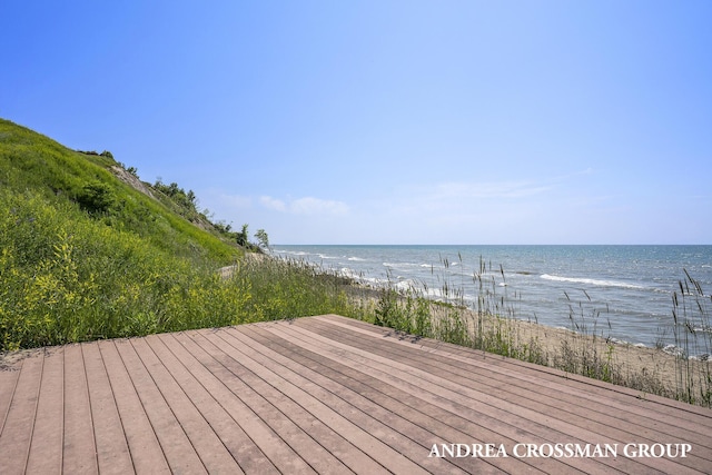 deck featuring a water view