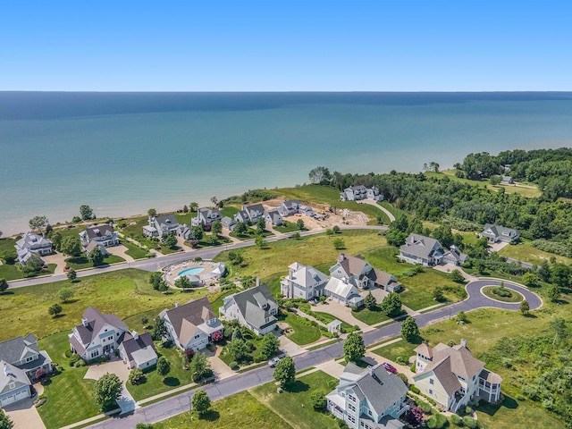 bird's eye view with a water view and a residential view