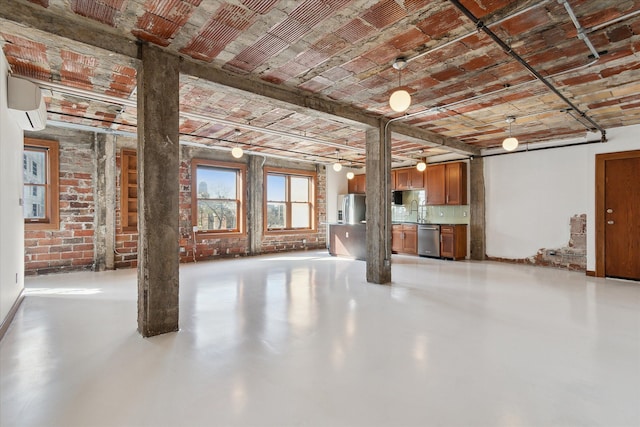 78 Watson St Unit 13, Detroit, MI 48201 - interior space featuring a sink, brick wall, and finished concrete floors