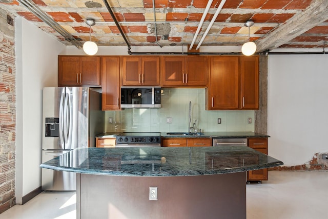 78 Watson St Unit 13, Detroit, MI 48201 - kitchen featuring appliances with stainless steel finishes, brown cabinets, decorative backsplash, and a sink