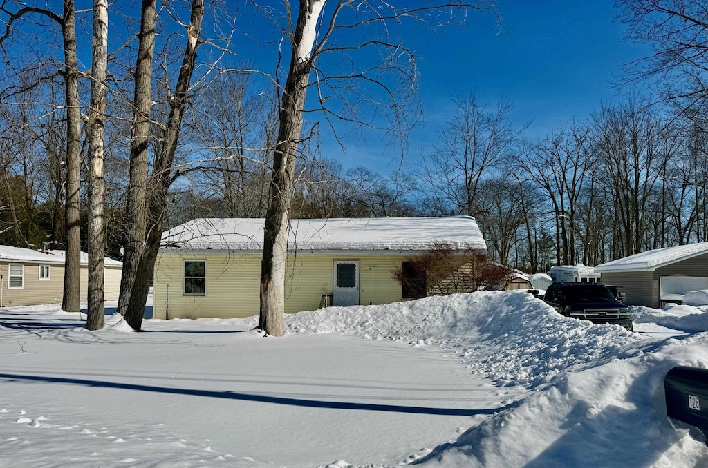 view of snow covered property